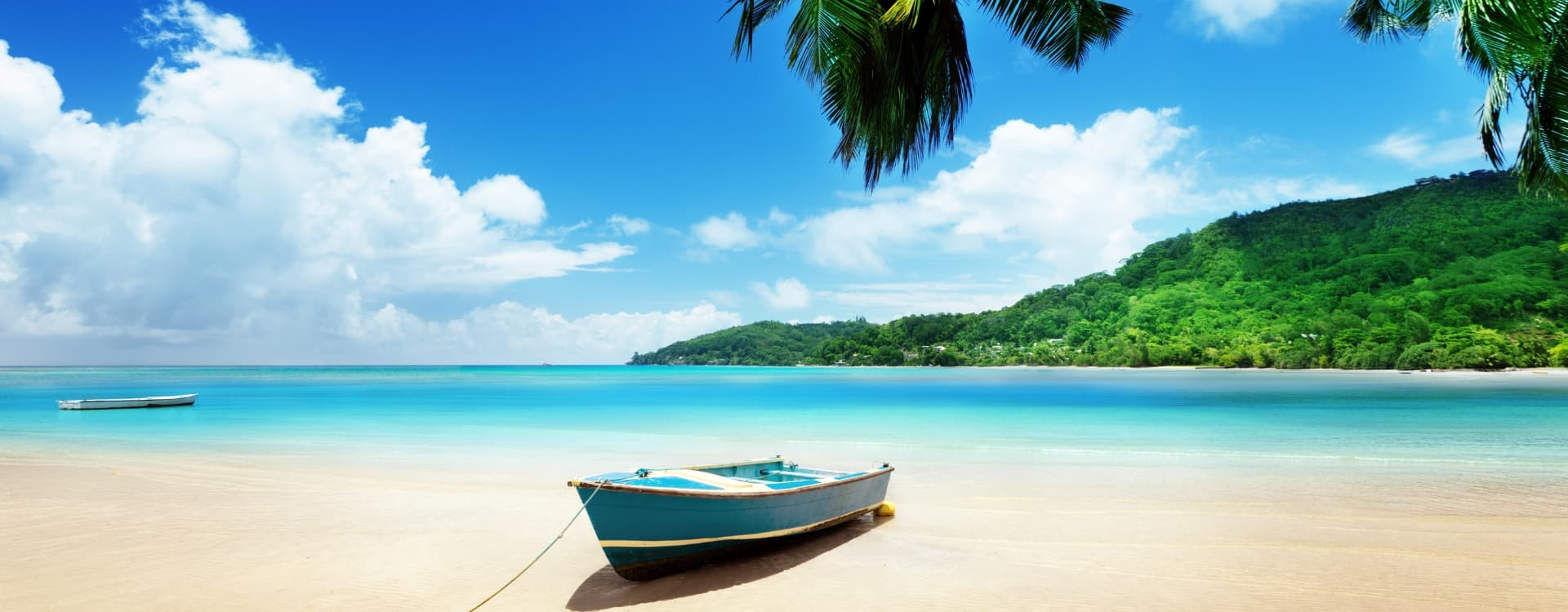 Tied boat on sand at Mahe island, Seychelles